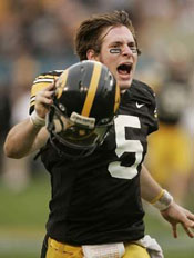 Drew Tate runs downfield after completing winning pass.